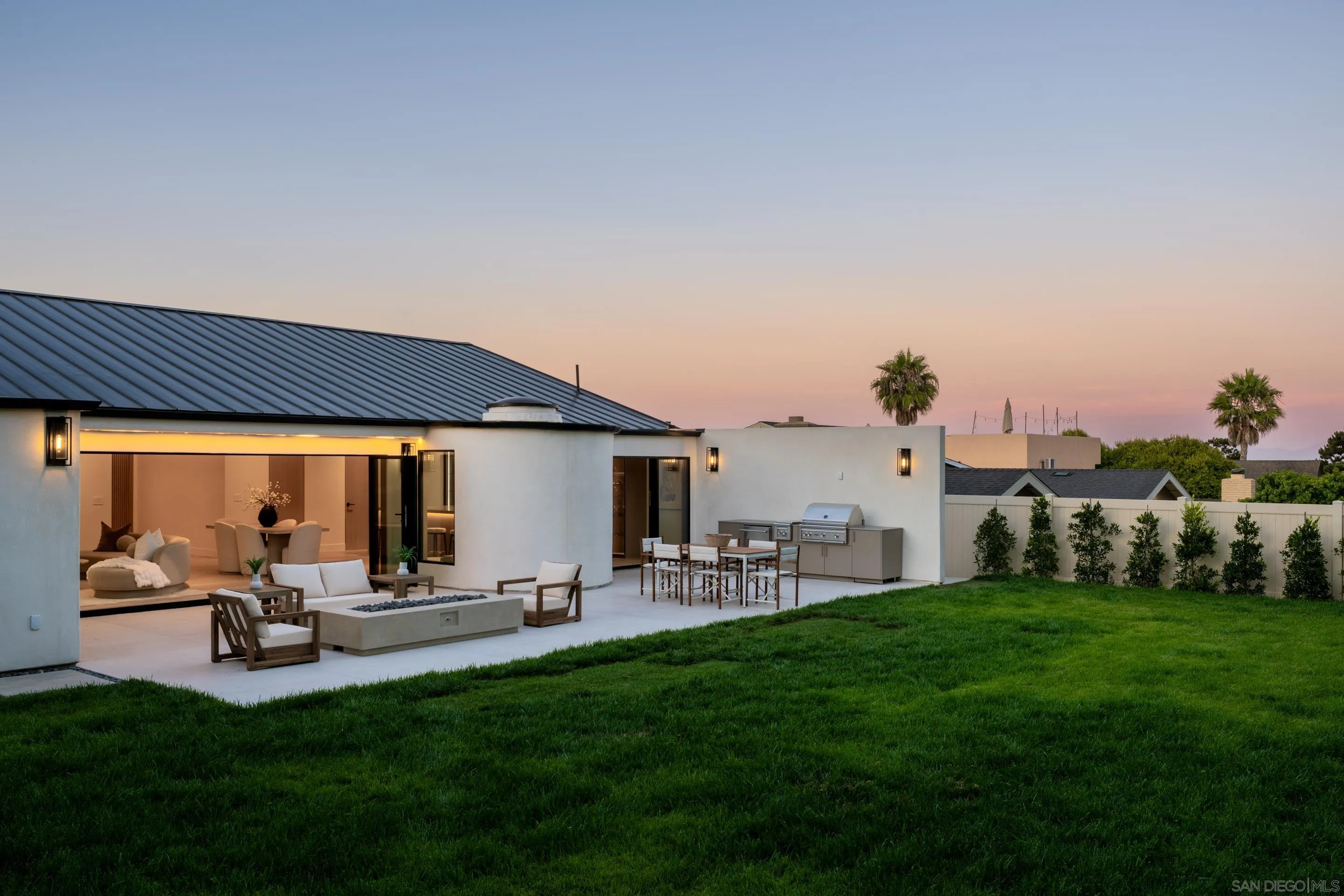 5826 Soledad Mountain Road La Jolla, CA 92037 - Photo 38 of 52 a view of a house with backyard porch and sitting area