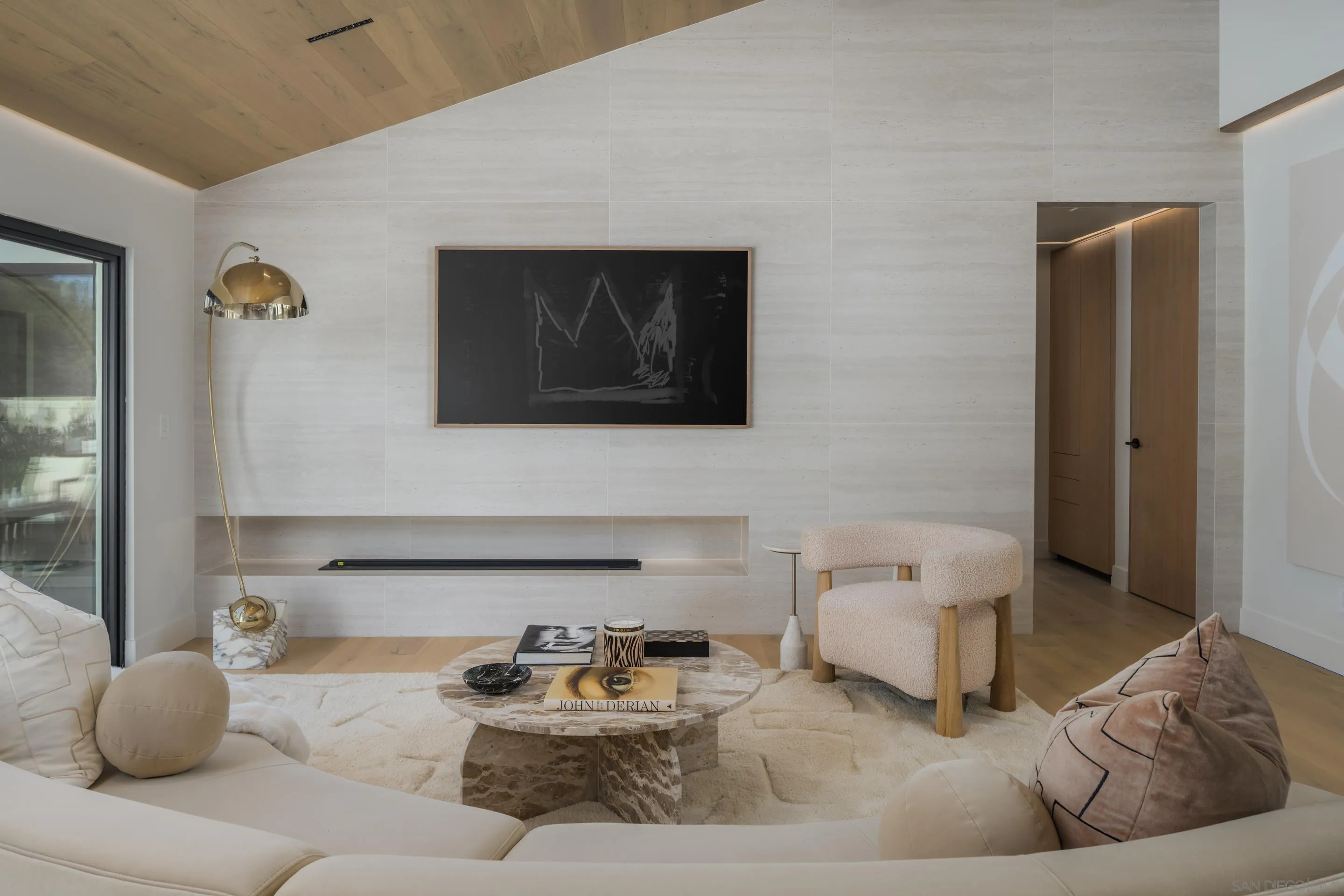 5826 Soledad Mountain Road La Jolla, CA 92037 - Photo 5 of 52 a living room with furniture and a mirror