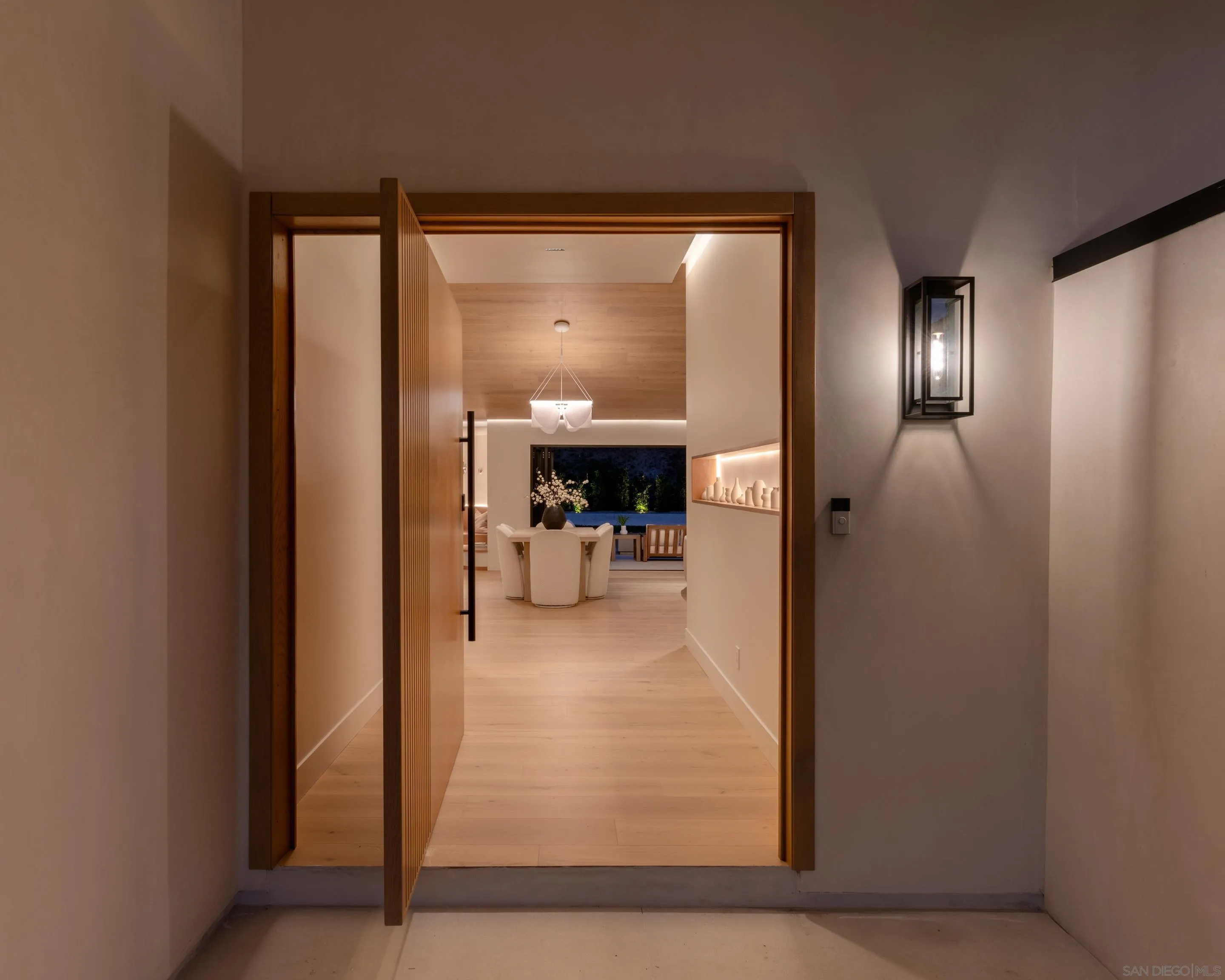 5826 Soledad Mountain Road La Jolla, CA 92037 - Photo 52 of 52 a view of a hallway and a livingroom with a chair