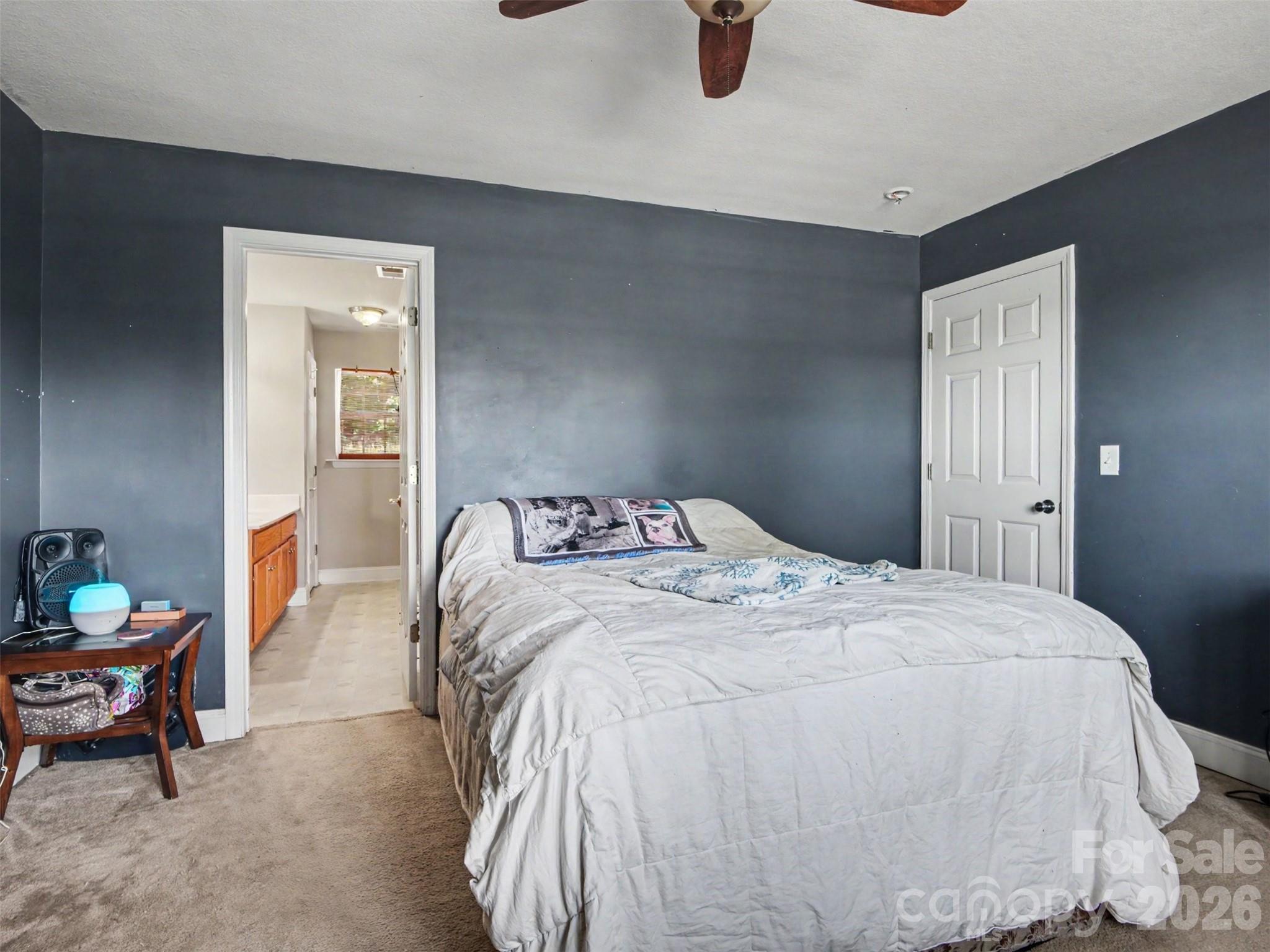 539 Brawley Road Cleveland, NC 27013 - Photo 14 of 41 a bedroom with a bed and table