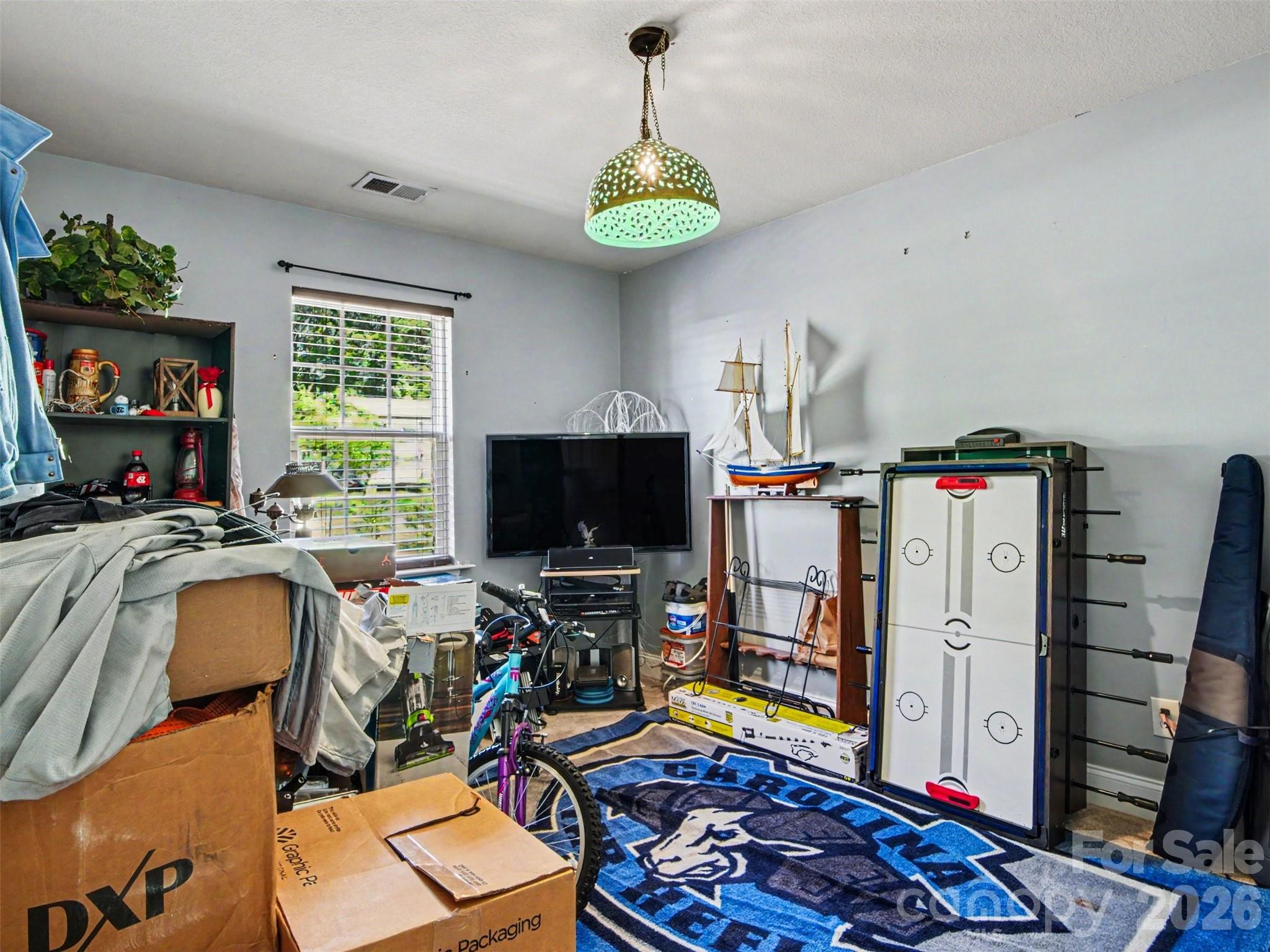 539 Brawley Road Cleveland, NC 27013 - Photo 19 of 41 a room with furniture a flat screen tv and a window