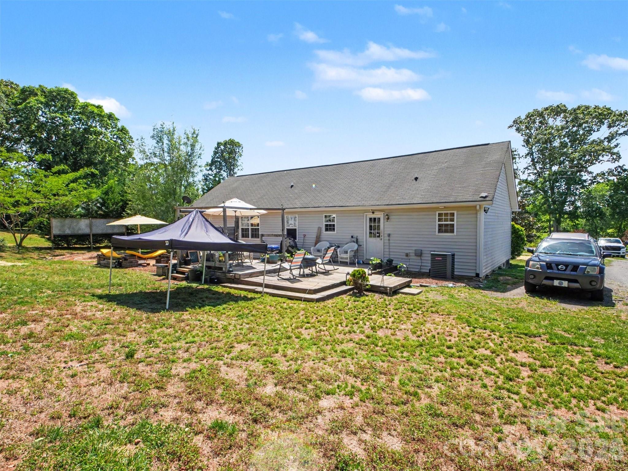 539 Brawley Road Cleveland, NC 27013 - Photo 29 of 41 a view of a house with swimming pool and sitting area