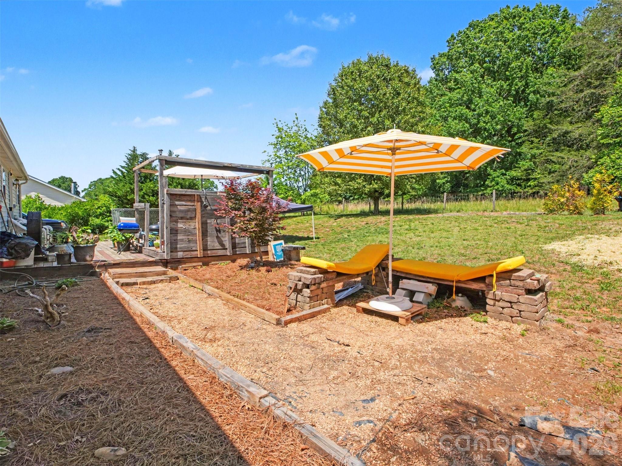 539 Brawley Road Cleveland, NC 27013 - Photo 32 of 41 a view of a swimming pool with a patio