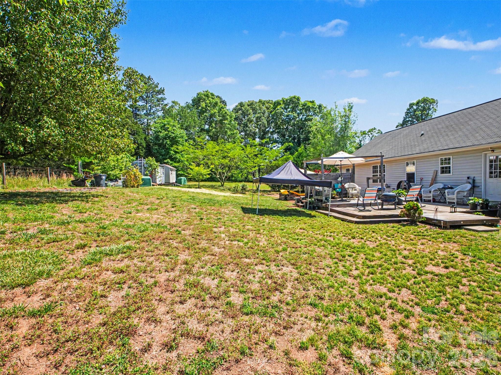 539 Brawley Road Cleveland, NC 27013 - Photo 34 of 41 a small pool with outdoor seating and yard
