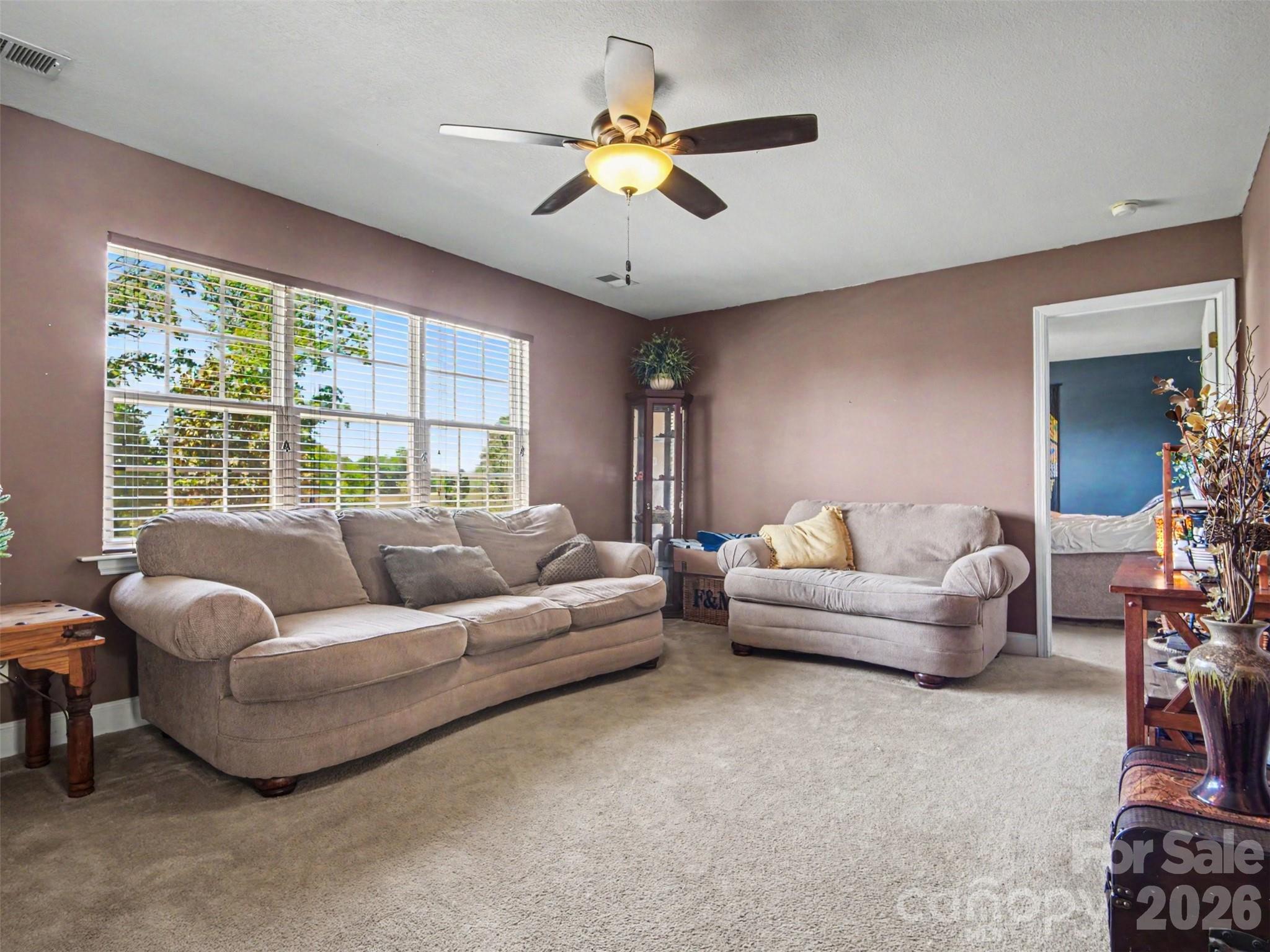 539 Brawley Road Cleveland, NC 27013 - Photo 5 of 41 a living room with furniture and a large window