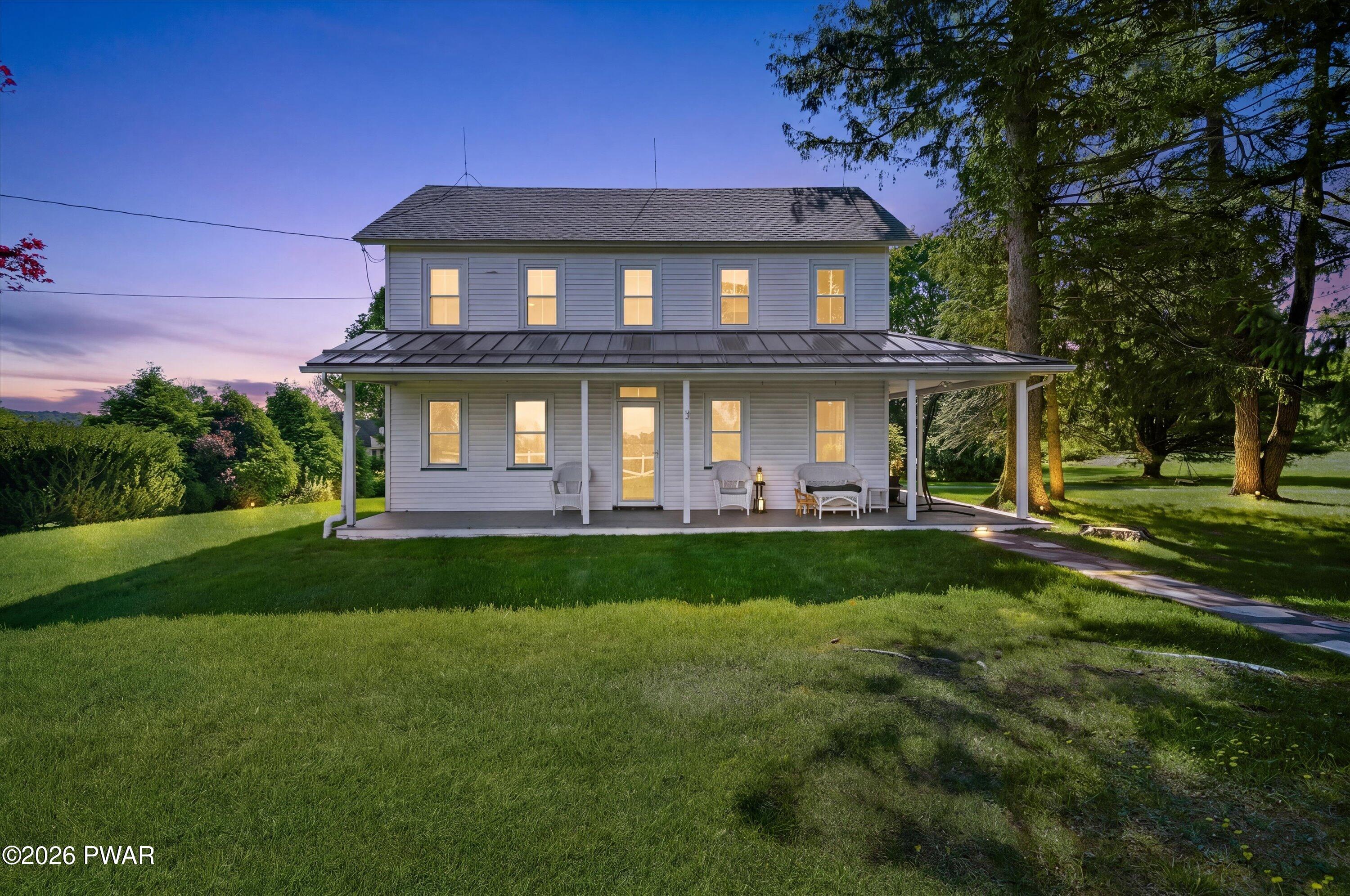 127 Valleyview Road Greentown, PA 18426 - Photo 2 of 66 a front view of a house with a yard