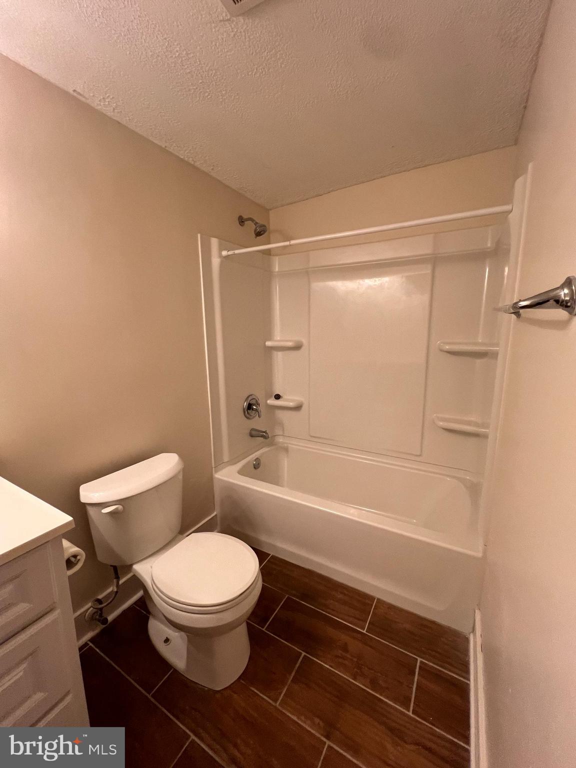 400 East Washington Street, Unit 1 Charles Town, WV 25414 - Photo 8 of 9 a bathroom with a toilet and a shower