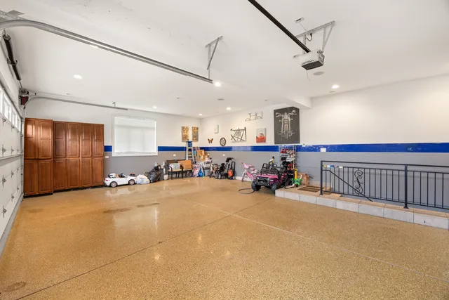 a view of a livingroom with furniture and a garage