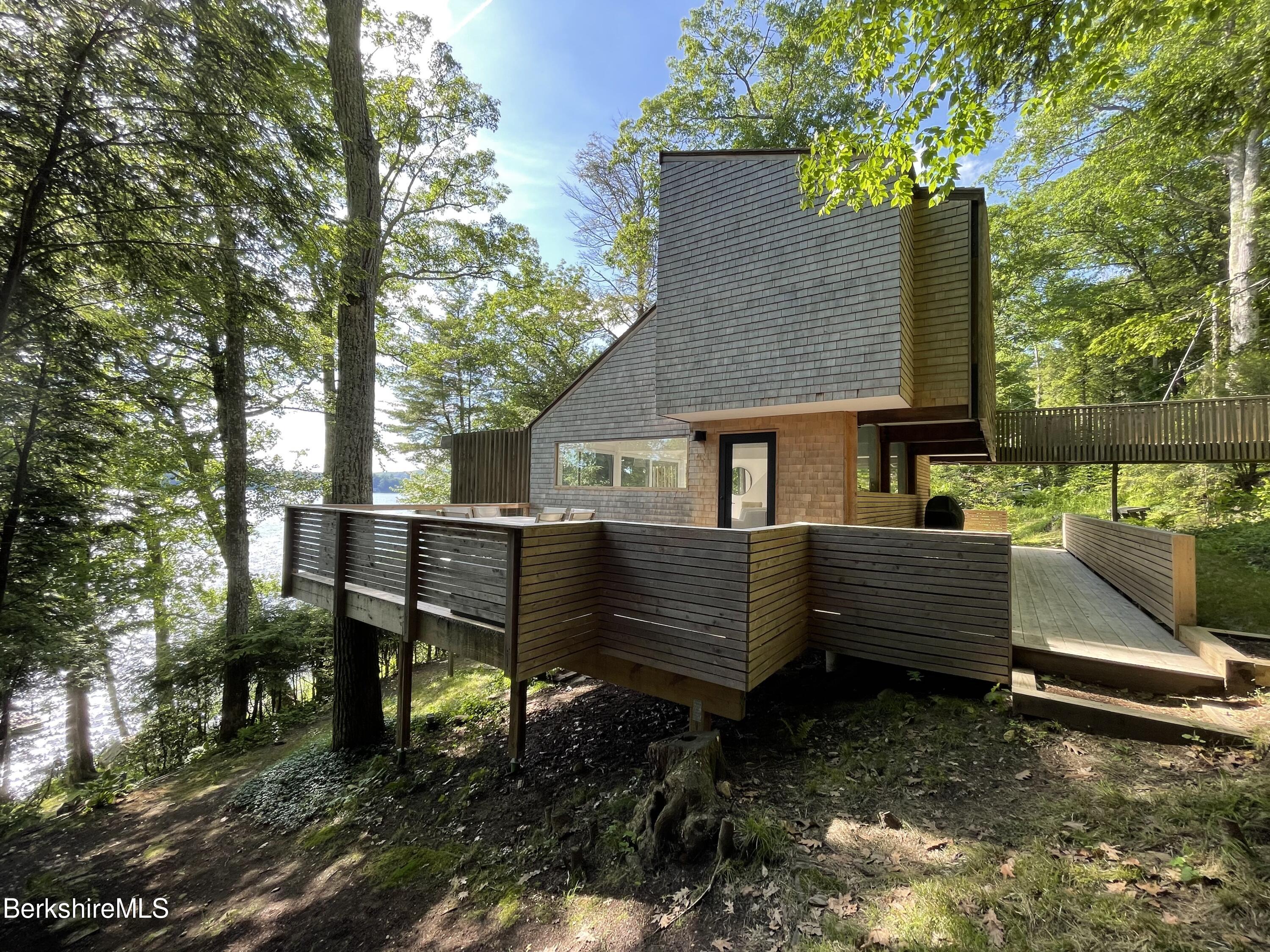 a view of a chairs setting on the deck