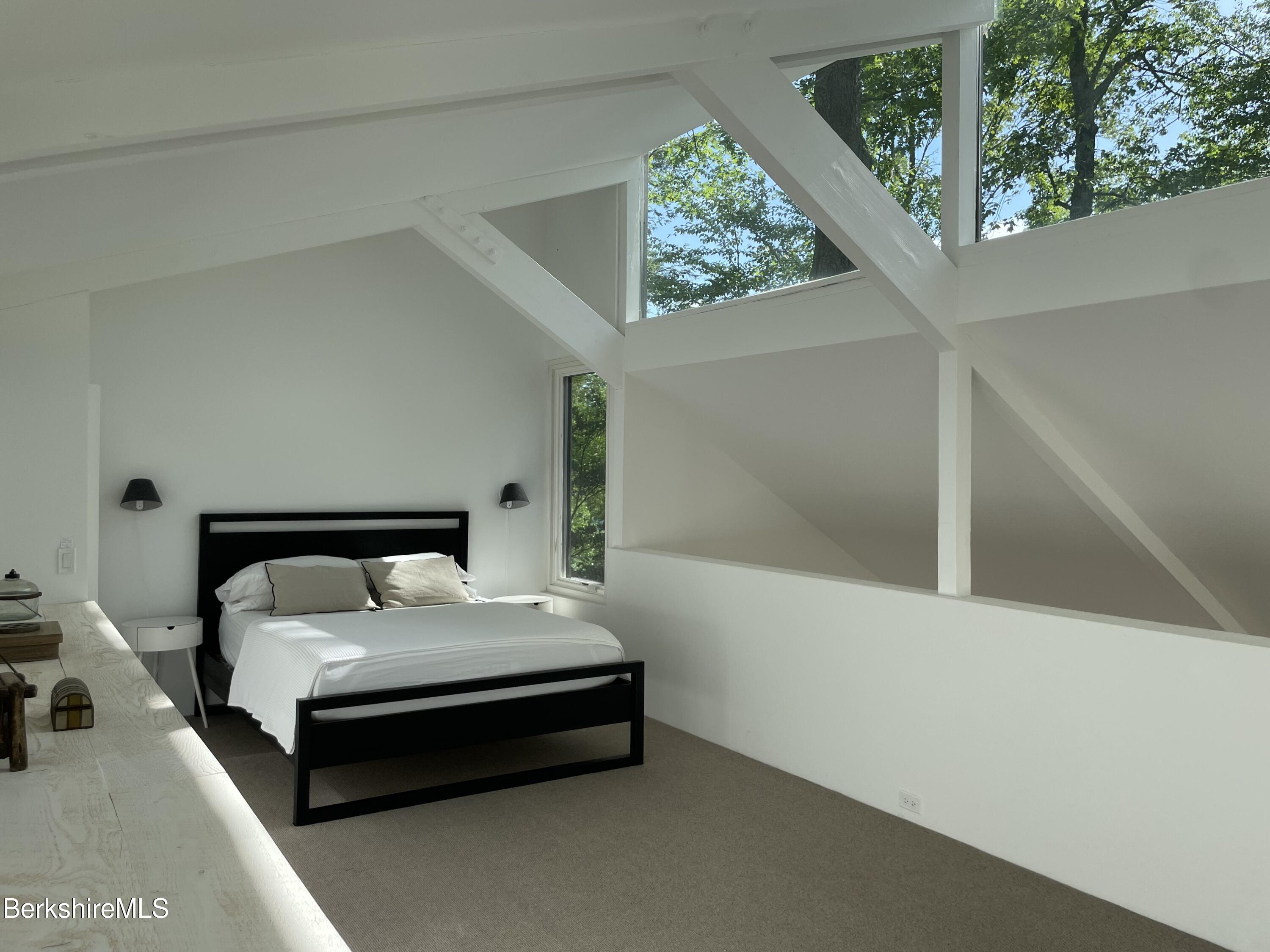 36 Elephant Rock Road Monterey, MA 01245 - Photo 18 of 30 a bedroom with a bed and window