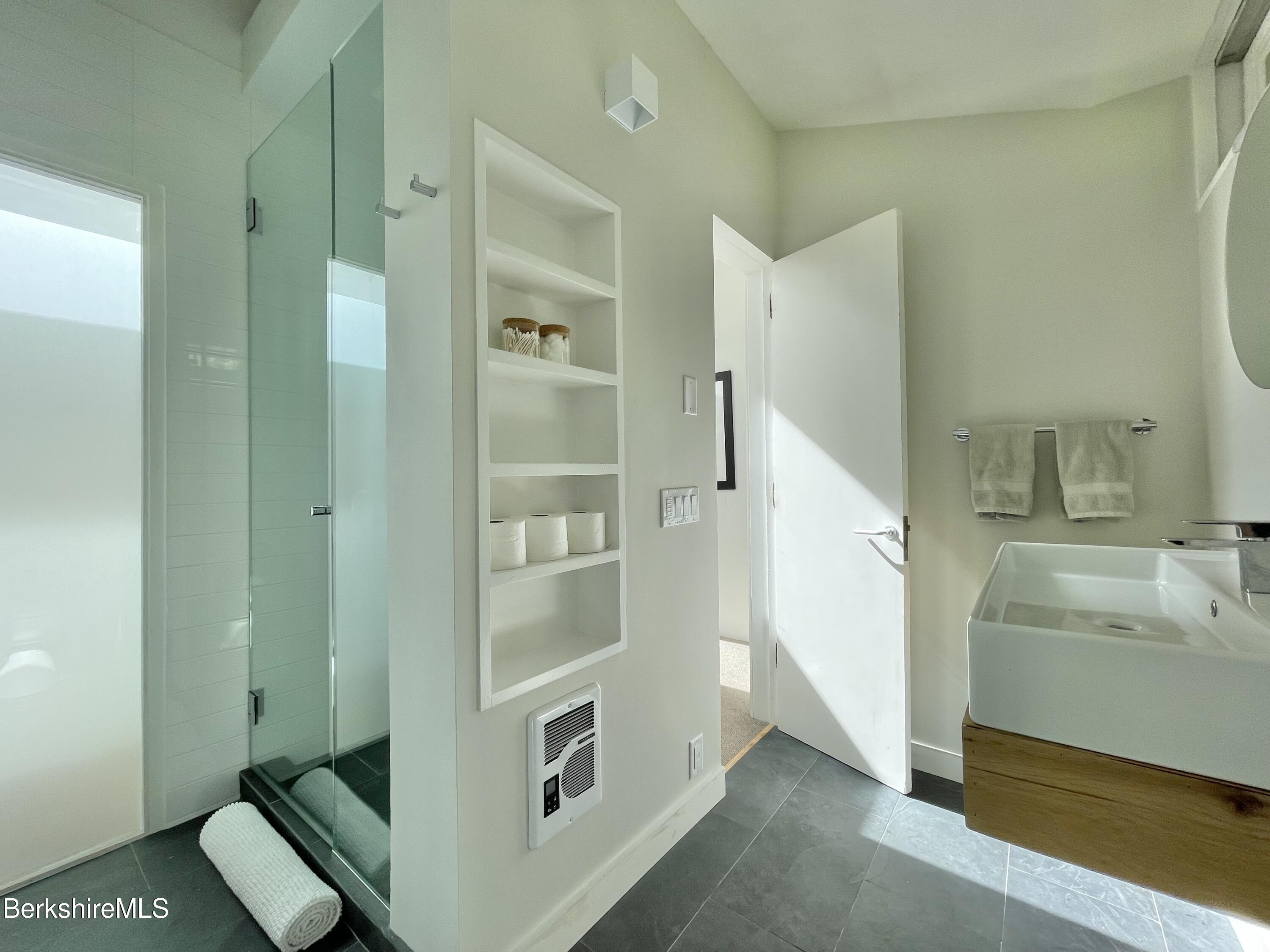 36 Elephant Rock Road Monterey, MA 01245 - Photo 20 of 30 a view of bathroom with a sink and mirror