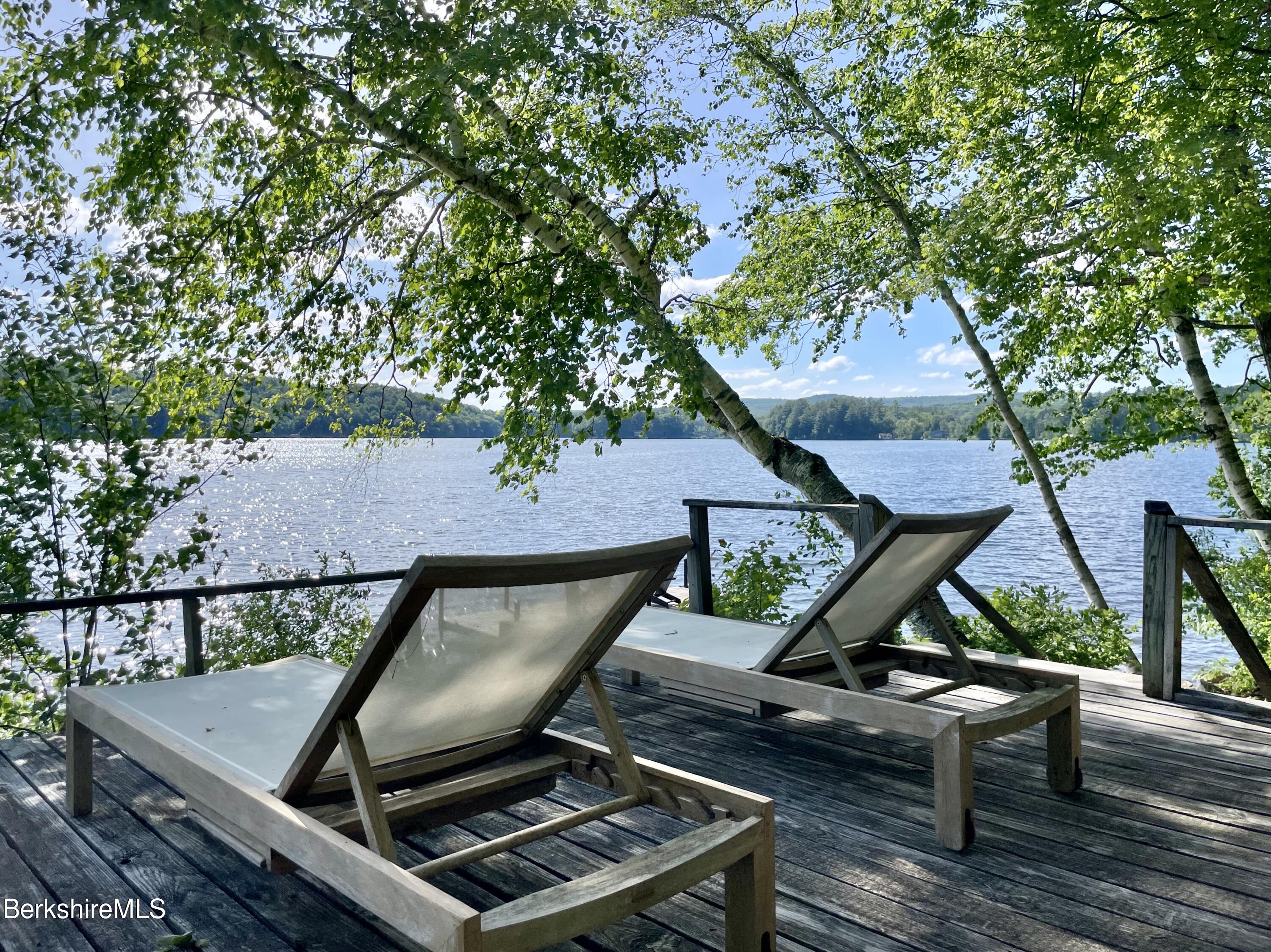 36 Elephant Rock Road Monterey, MA 01245 - Photo 29 of 30 a view of a chairs and table on the wooden floor