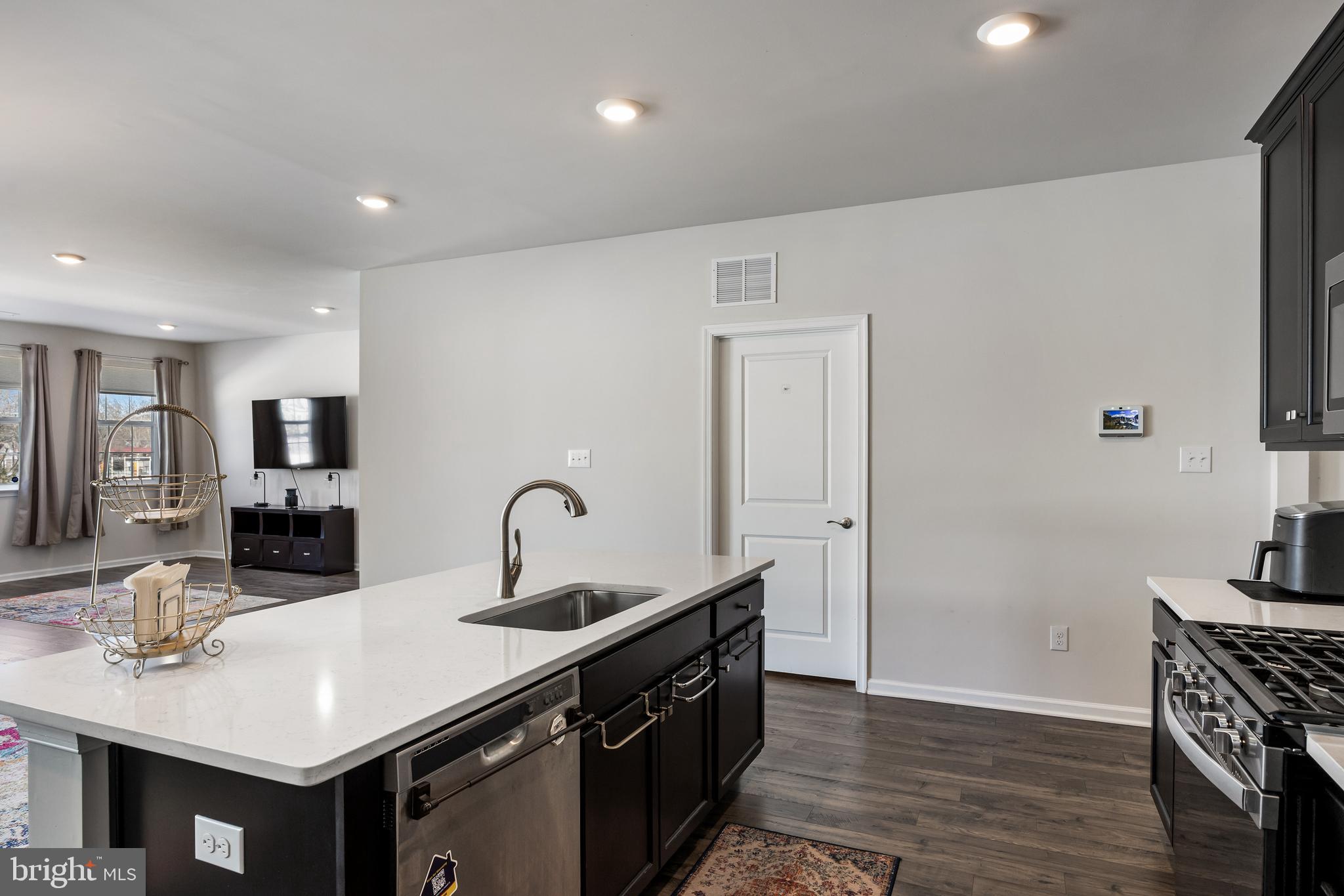 15 Walton Way Delanco, NJ 08075 - Photo 13 of 33 a kitchen with granite countertop a sink and cabinets