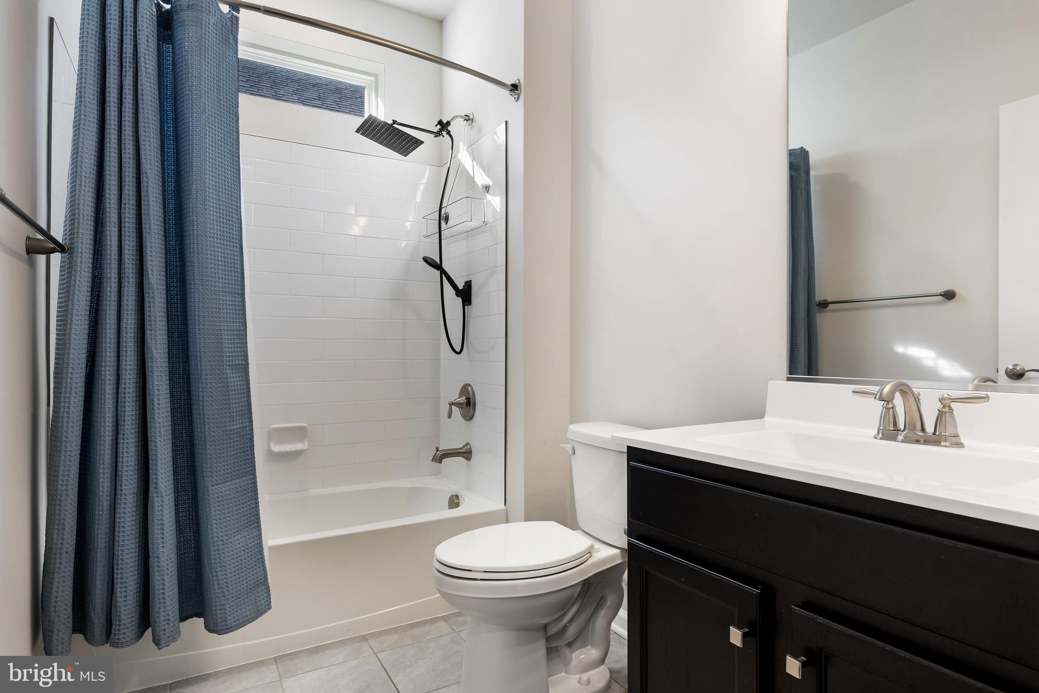 15 Walton Way Delanco, NJ 08075 - Photo 26 of 33 a bathroom with a sink a toilet and shower