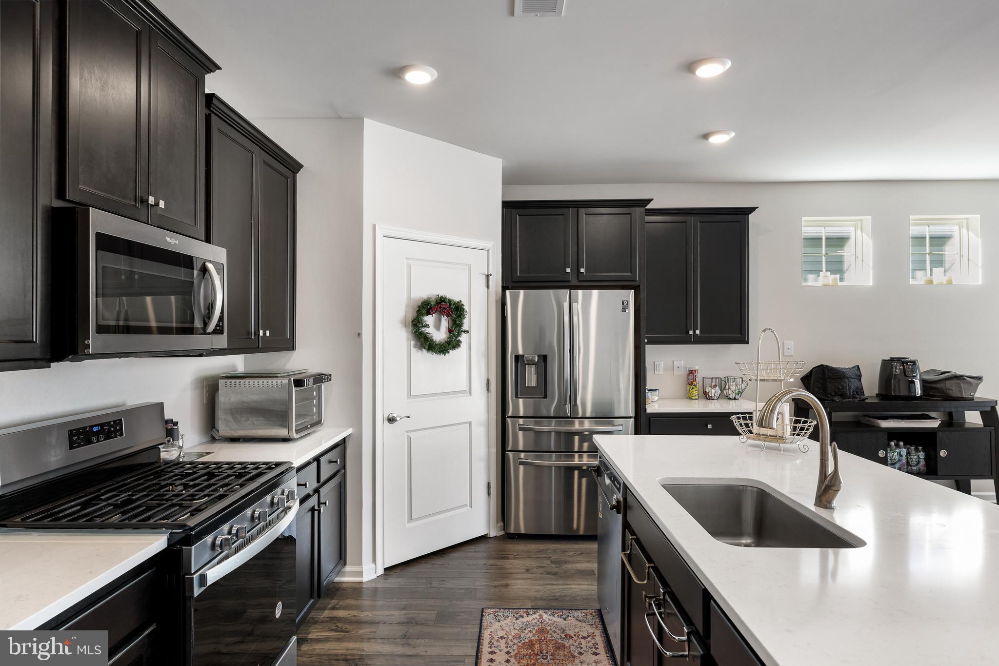 15 Walton Way Delanco, NJ 08075 - Photo 8 of 33 a kitchen that has a sink cabinets and stainless steel appliances
