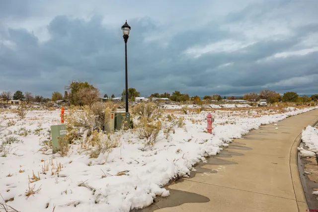 a view of swimming pool with outdoor seating