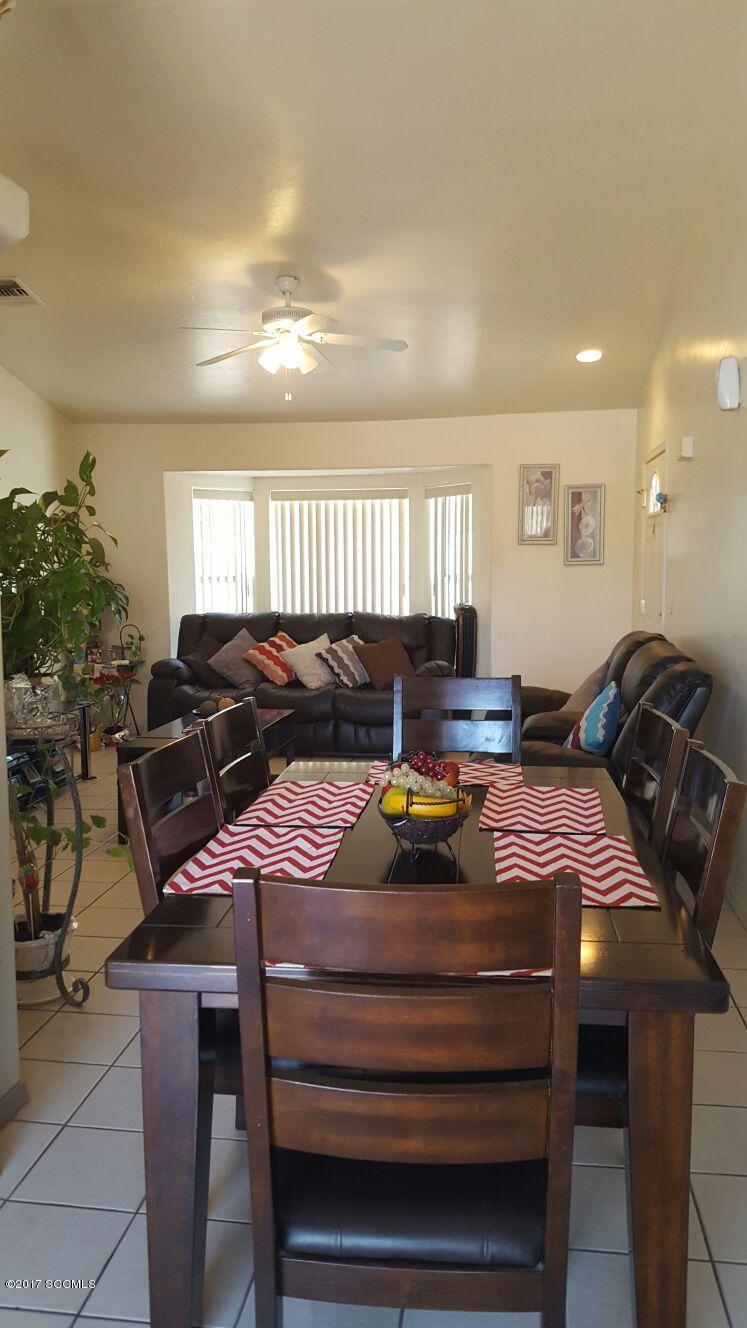 976 Calle Coyote Rio Rico, AZ 85648 - Photo 3 of 12 a view of a dining room with furniture