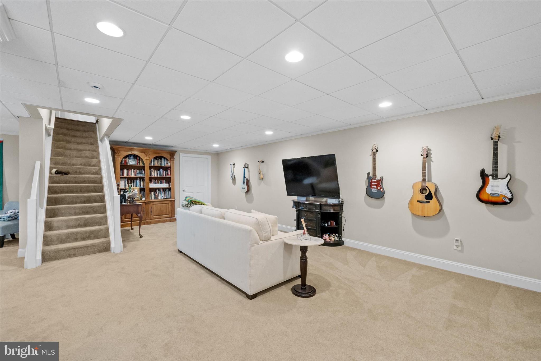 3 Pheasants Ridge North Wilmington, DE 19807 - Photo 67 of 102 a living room with furniture and a flat screen tv