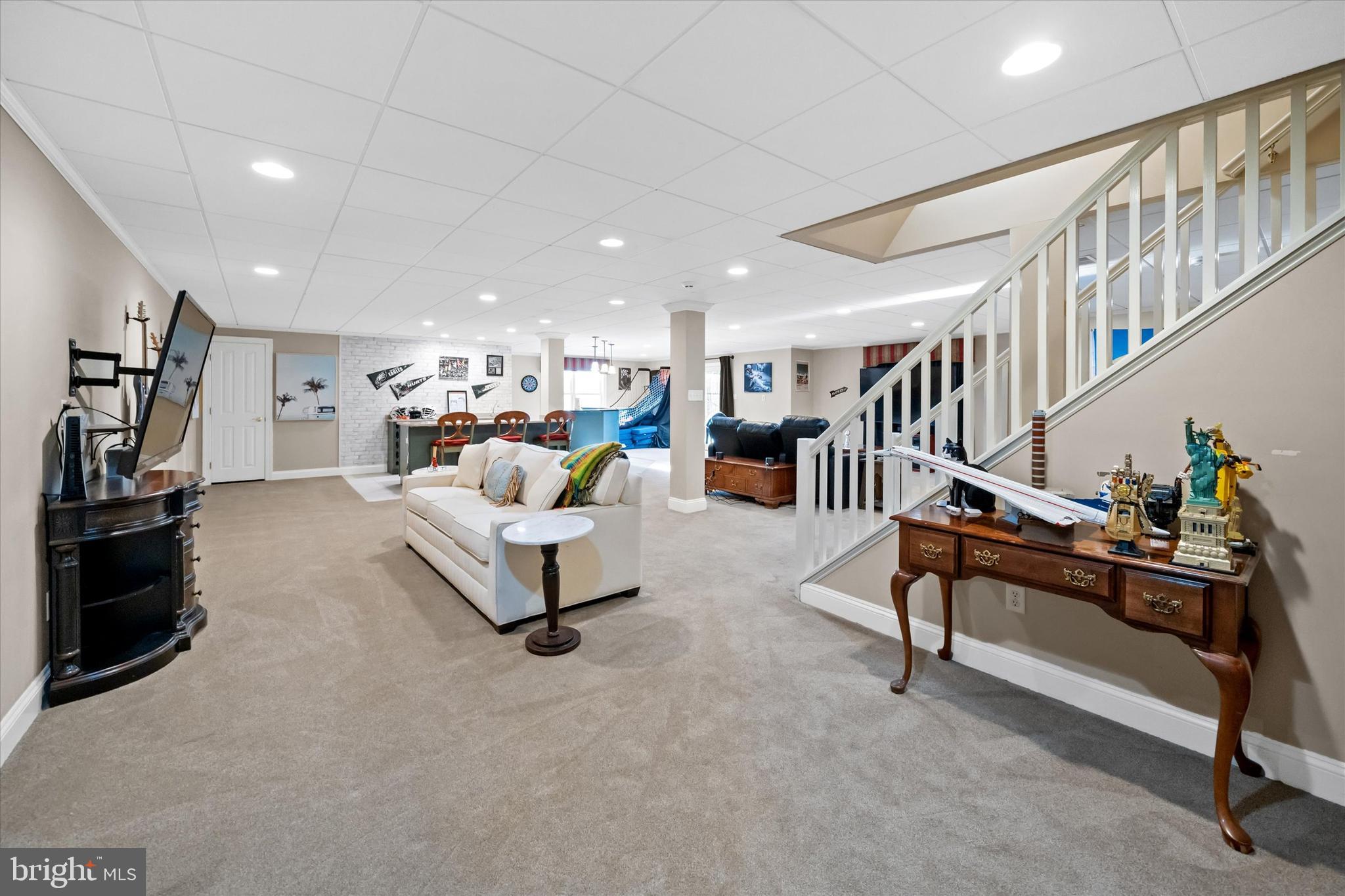 3 Pheasants Ridge North Wilmington, DE 19807 - Photo 77 of 102 a living room with furniture and a flat screen tv