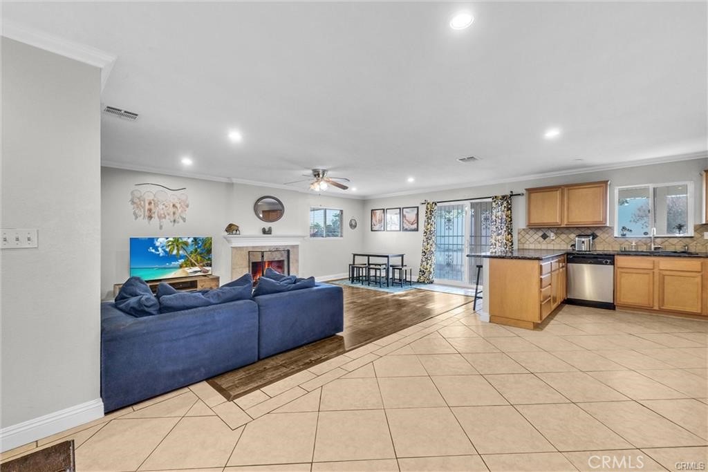 6220 Filkins Avenue Rancho Cucamonga, CA 91737 - Photo 2 of 16 a living room with furniture and kitchen view