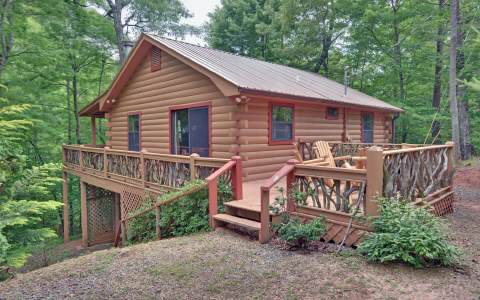 952 Little Bushy Head Road Blue Ridge, GA 30513 - Photo 1 of 1 a view of a wooden deck front of house