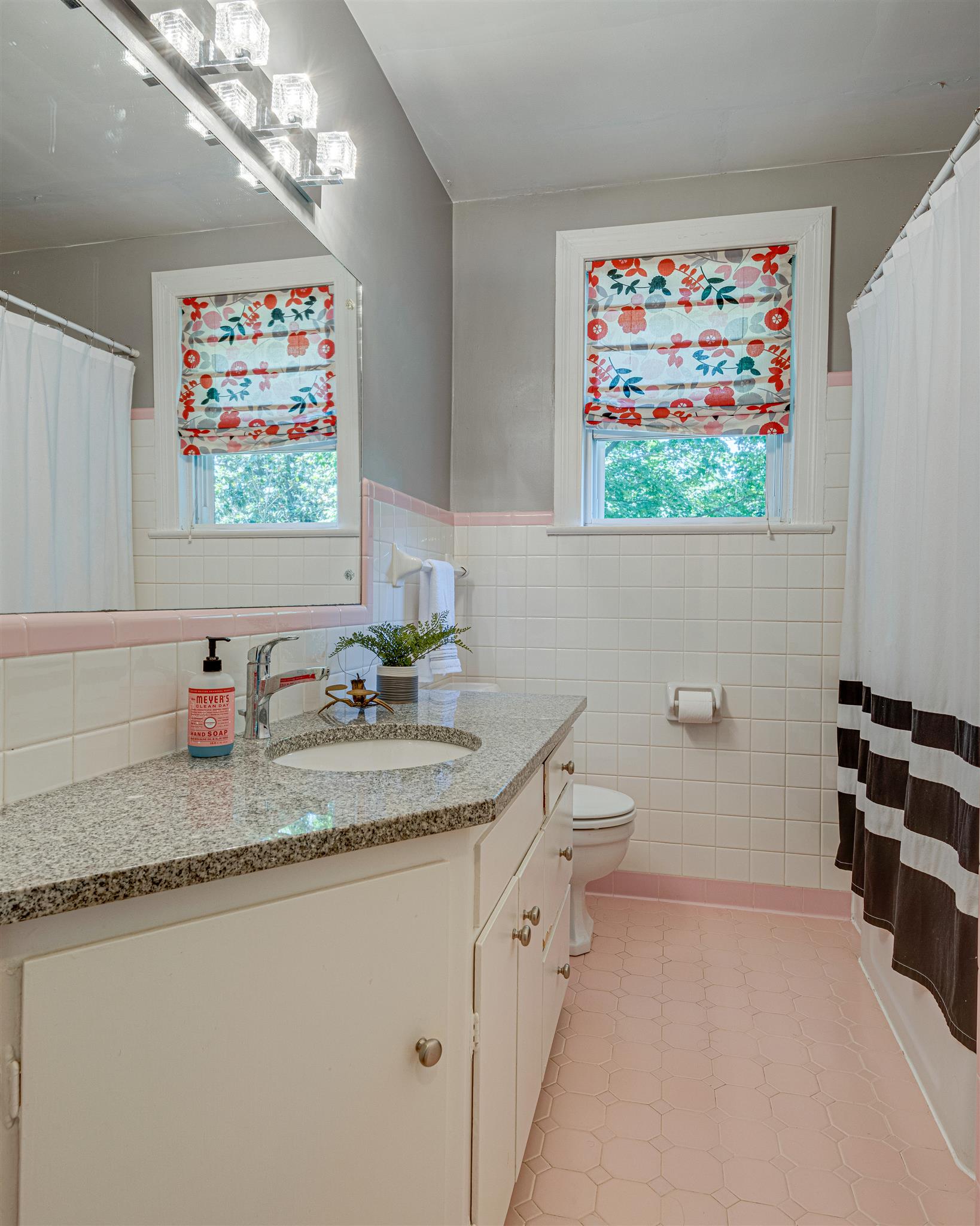 3900 Murphy Road Nashville, TN 37209 - Photo 12 of 30 Retro chic pink tile pairs with granite counter for an updated vintage full bath