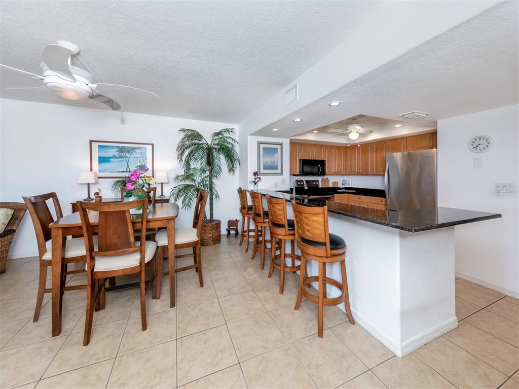 601 Shreve Street, Unit 51B Punta Gorda, FL 33950 - Photo 11 of 43 a group of people sitting in a living room