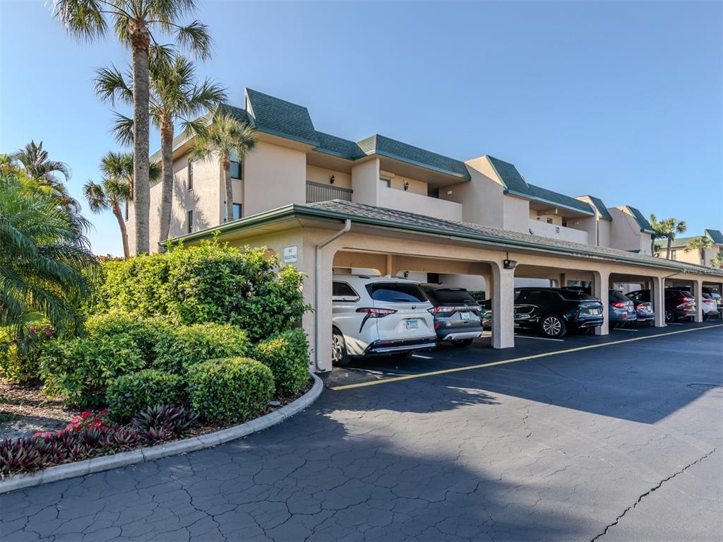 601 Shreve Street, Unit 51B Punta Gorda, FL 33950 - Photo 2 of 43 a view of building with car parked