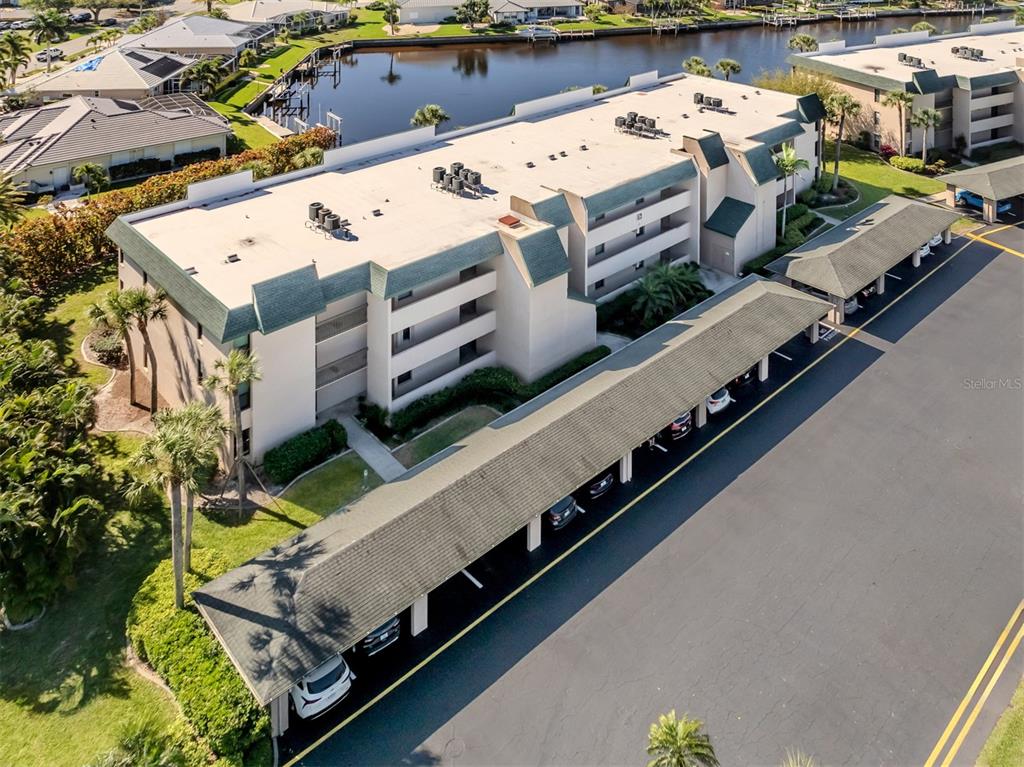 601 Shreve Street, Unit 51B Punta Gorda, FL 33950 - Photo 30 of 43 an aerial view of residential houses with outdoor space