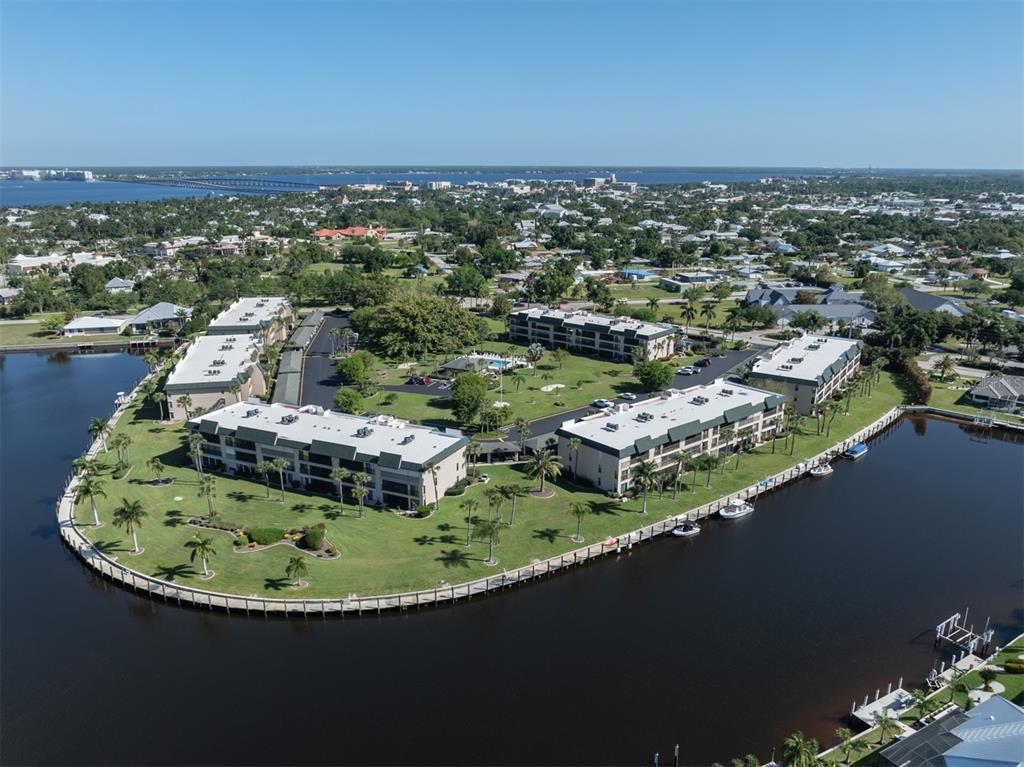 601 Shreve Street, Unit 51B Punta Gorda, FL 33950 - Photo 37 of 43 a view of a swimming pool with a lake view