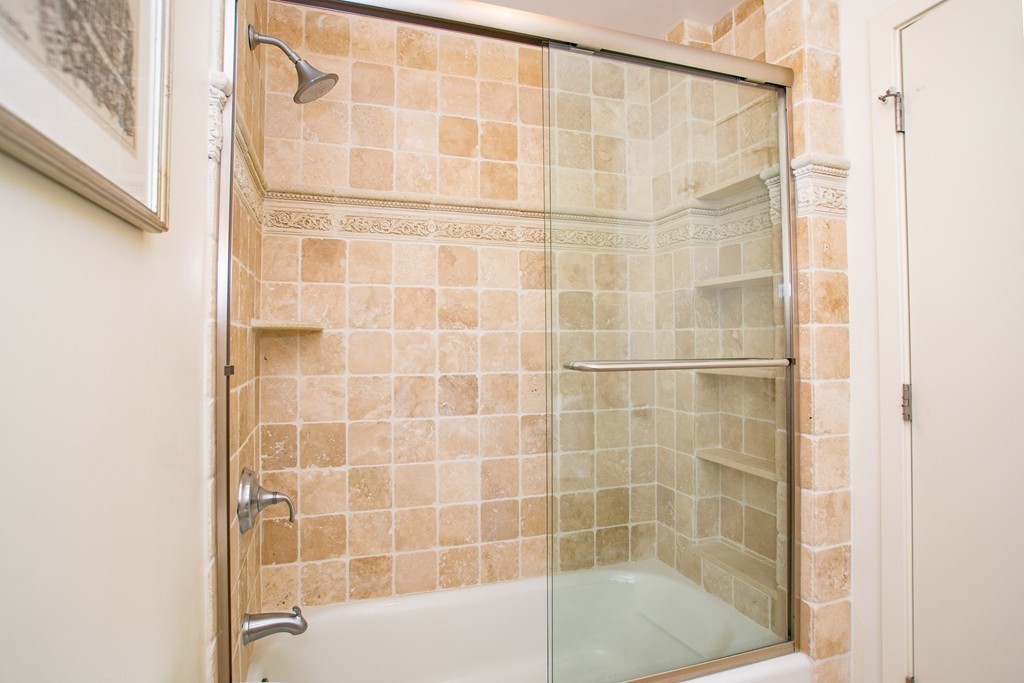 99-105 Broad Street, Unit 8C Boston, MA 02110 - Photo 13 of 28 a bathroom with a shower