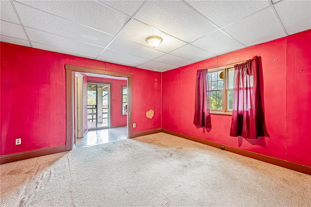 4 Howe Street Elrama, PA 15038 - Photo 11 of 29 a view of empty room with red walls