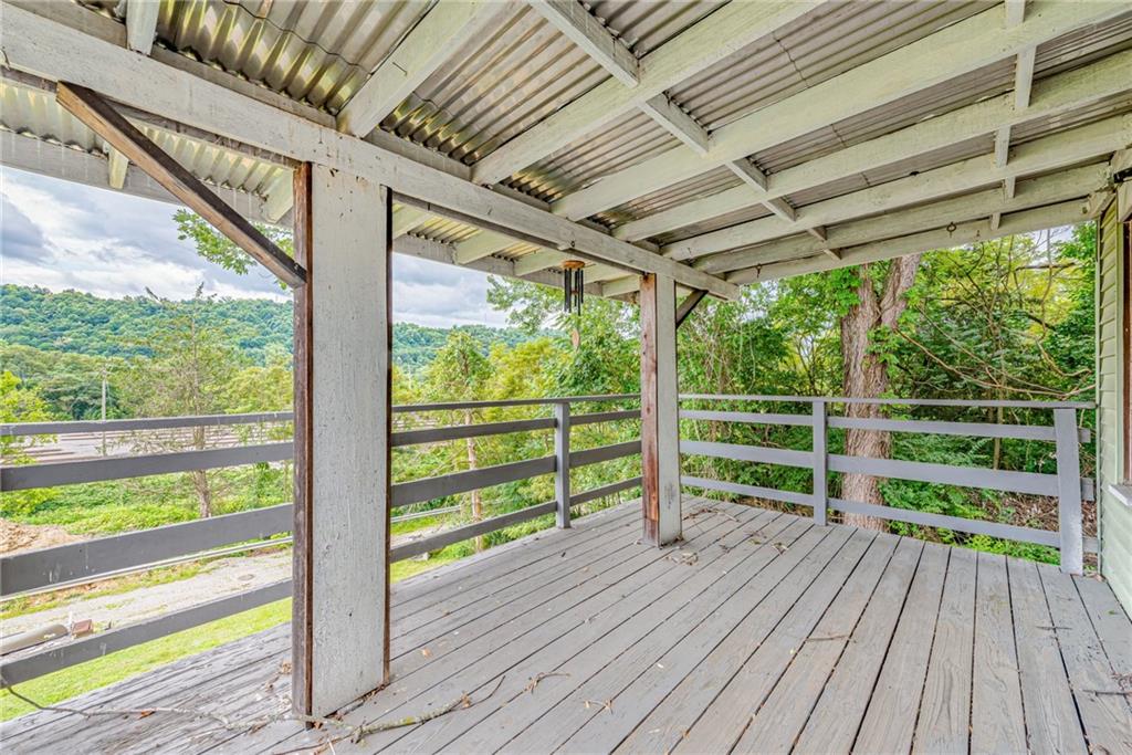 4 Howe Street Elrama, PA 15038 - Photo 14 of 29 a view of porch with wooden floor in outdoor space