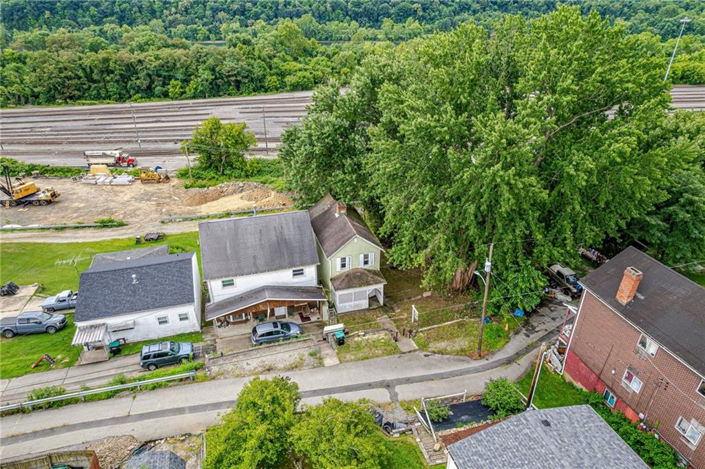 4 Howe Street Elrama, PA 15038 - Photo 25 of 29 an aerial view of a house with a garden and lake view