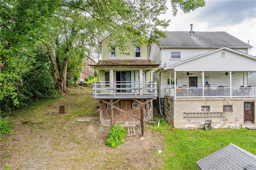 4 Howe Street Elrama, PA 15038 - Photo 28 of 29 a view of house with swimming pool and sitting area