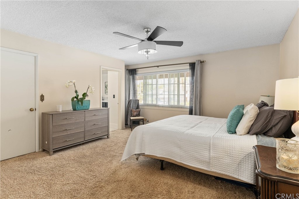 1766 North Mockingbird Place Orange, CA 92867 - Photo 15 of 39 a bedroom with a bed and a dresser