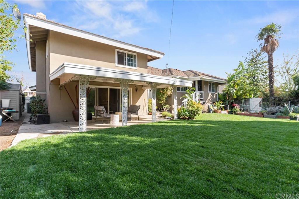 1766 North Mockingbird Place Orange, CA 92867 - Photo 27 of 39 a front view of a house with swimming pool having outdoor seating