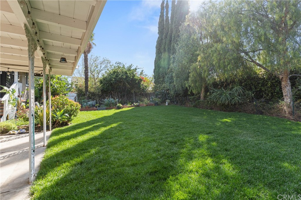 1766 North Mockingbird Place Orange, CA 92867 - Photo 28 of 39 a view of a garden with a building in the background