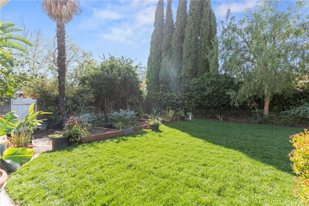 1766 North Mockingbird Place Orange, CA 92867 - Photo 34 of 39 a view of a backyard with a garden