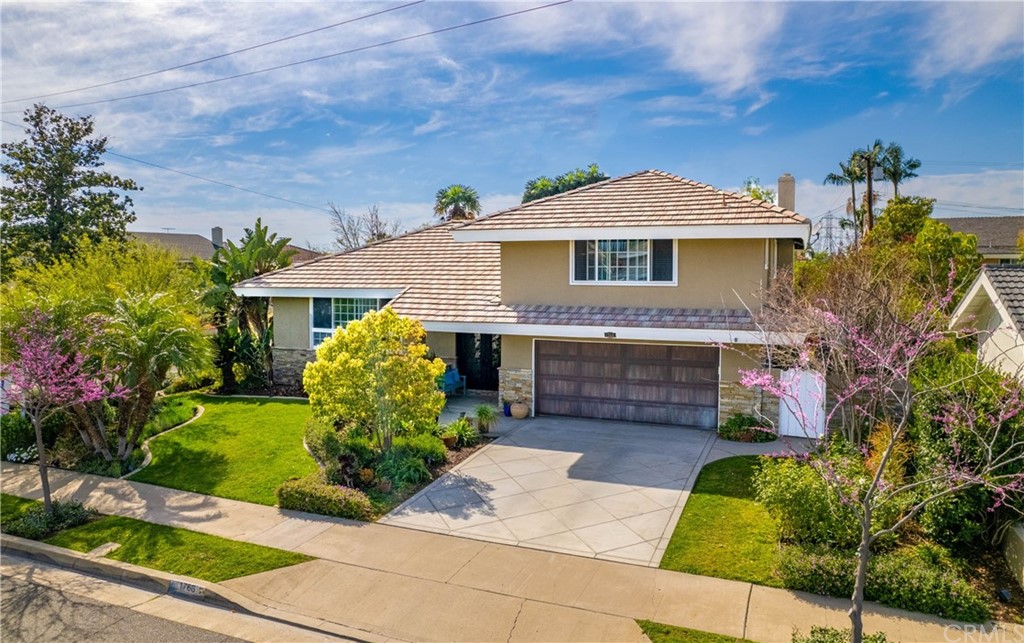 1766 North Mockingbird Place Orange, CA 92867 - Photo 39 of 39 a front view of a house with garden