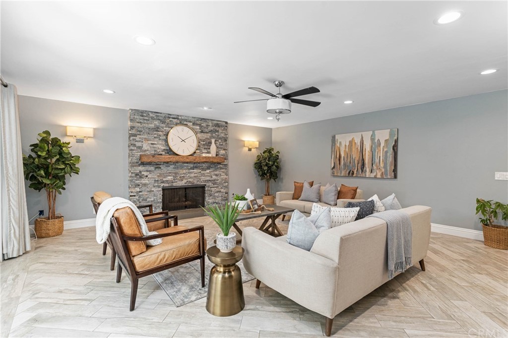 1766 North Mockingbird Place Orange, CA 92867 - Photo 4 of 39 a living room with furniture and a fireplace