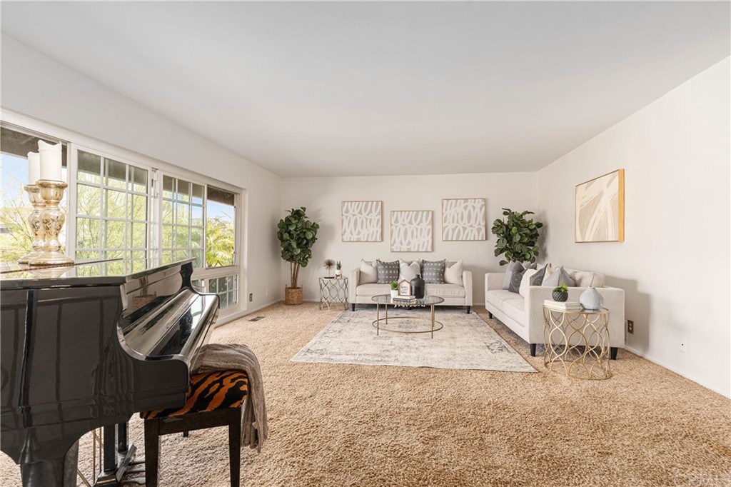1766 North Mockingbird Place Orange, CA 92867 - Photo 6 of 39 a living room with furniture windows and a flat screen tv