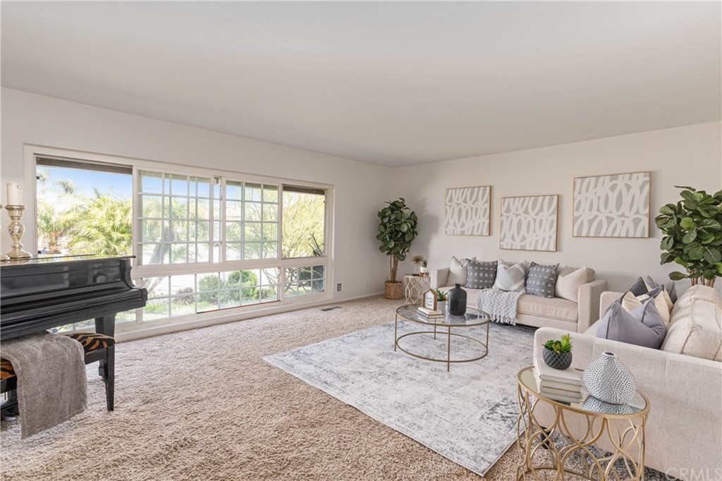 1766 North Mockingbird Place Orange, CA 92867 - Photo 7 of 39 a living room with furniture and a large window