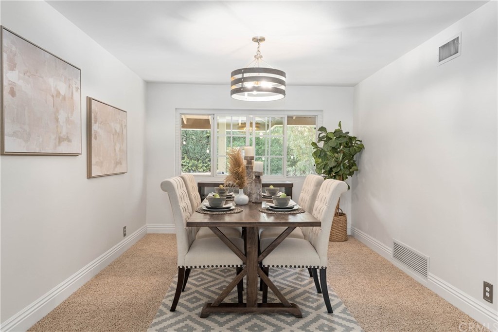1766 North Mockingbird Place Orange, CA 92867 - Photo 8 of 39 a view of a dining room with furniture window and outside view