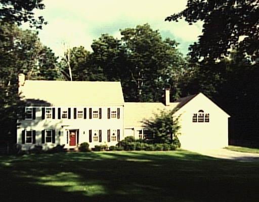 8 Silver Spring Road Wilton, CT 06897 - Photo 1 of 1 a view of house with garden and tall trees
