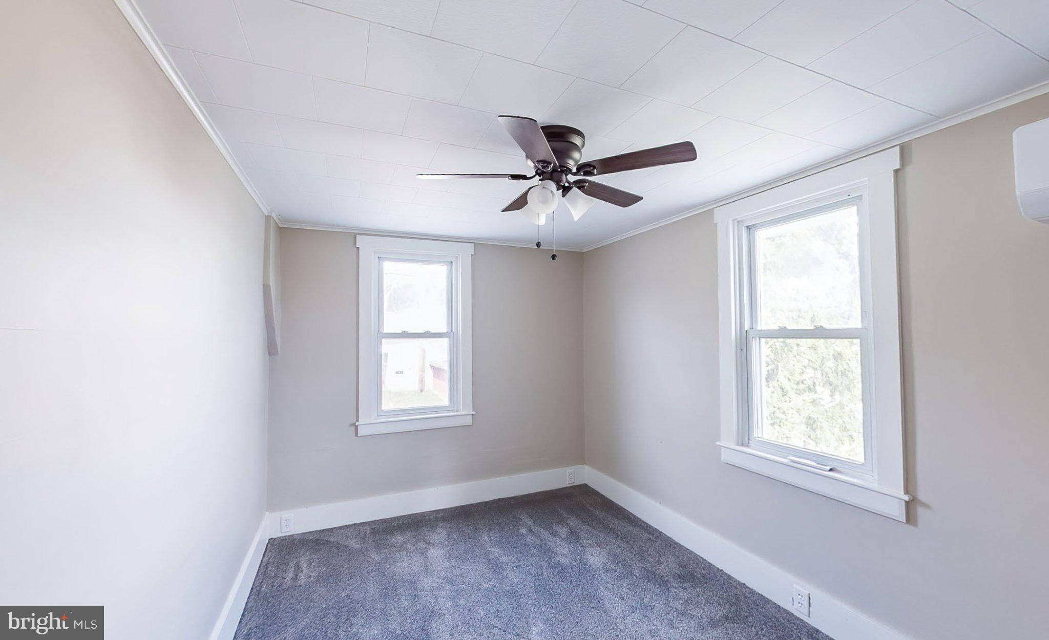 648 Main-Mifflin Road Nescopeck, PA 18635 - Photo 18 of 64 a view of an empty room with a window