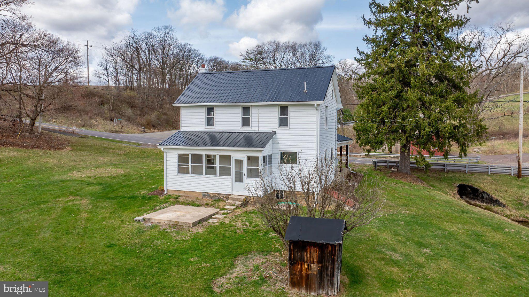 648 Main-Mifflin Road Nescopeck, PA 18635 - Photo 38 of 64 a front view of a house with garden
