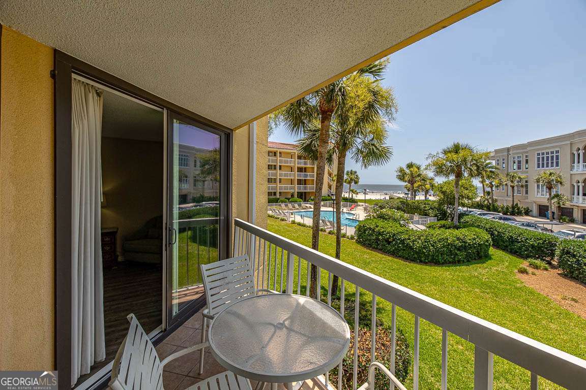 201 Neptune Road, Unit 258 St. Simons, GA 31522 - Photo 17 of 48 a view of balcony and patio