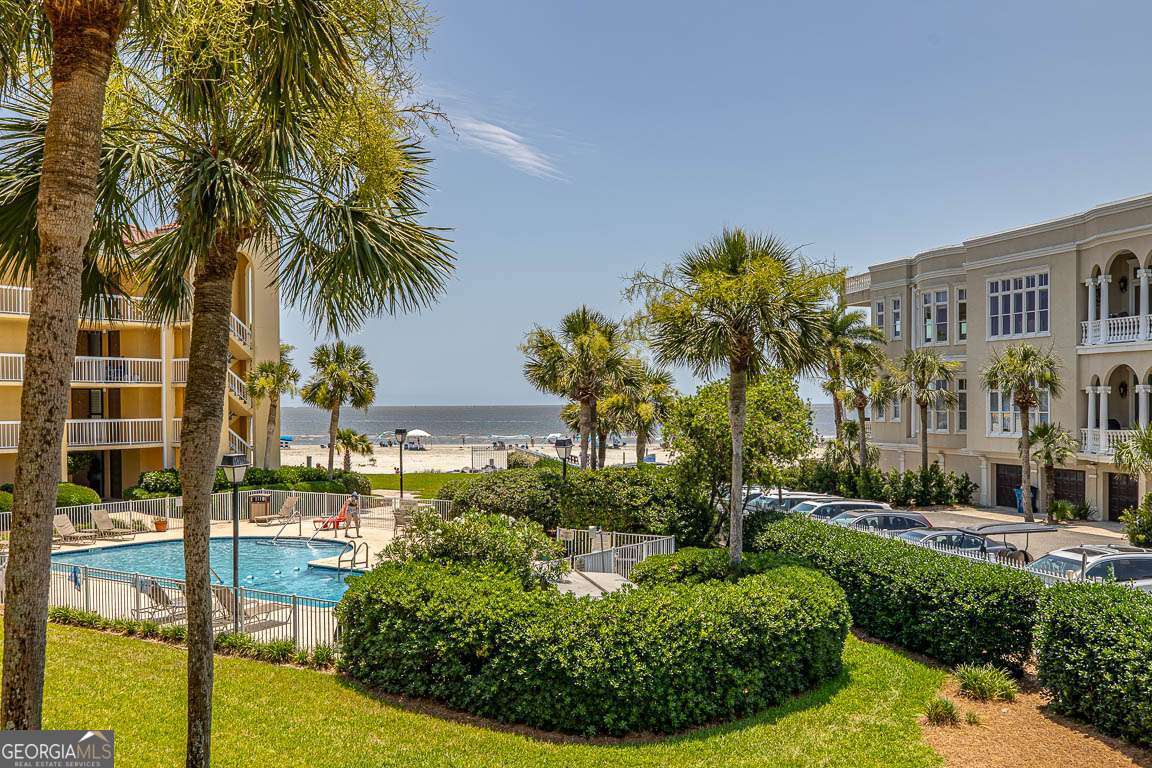 201 Neptune Road, Unit 258 St. Simons, GA 31522 - Photo 28 of 52 a view of multiple house with palm trees