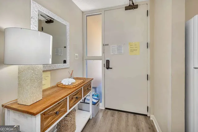 a bathroom with a sink a mirror and a shower